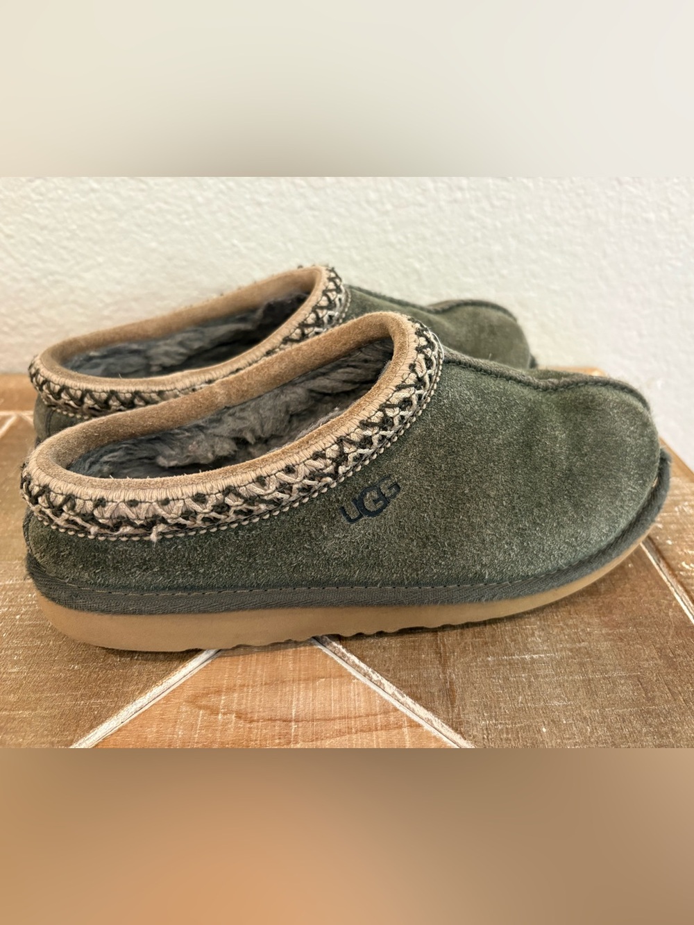 UGG Kids Olive Green Slip-On Shearling Slippers with Tan Trim